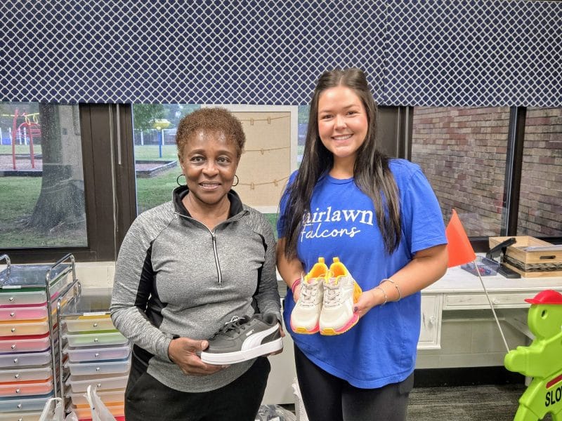 Teresa Carter "Ms. T" delivering shoes at Fairlawn Elementary School.