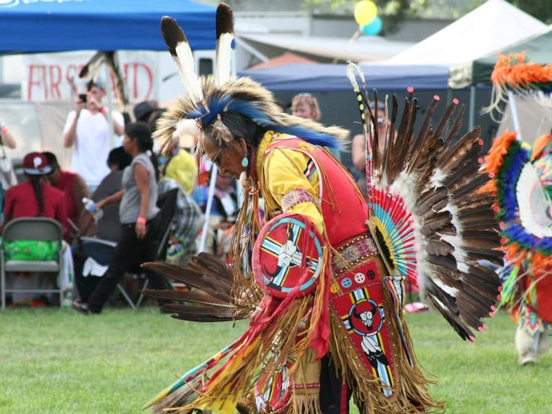 Native American man performing cultural dance